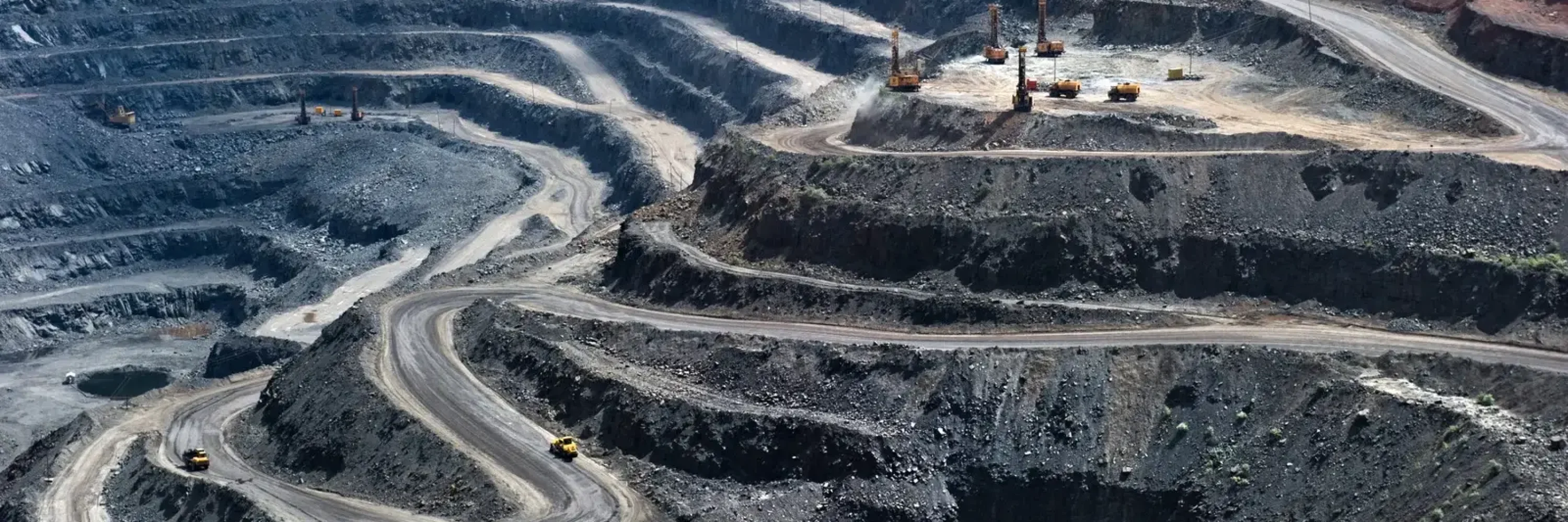 high-angle-view-winding-roads-open-pit-mine-scaled.jpg